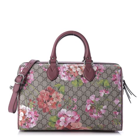 gucci supreme monogram blooms|Gucci leather handbags.